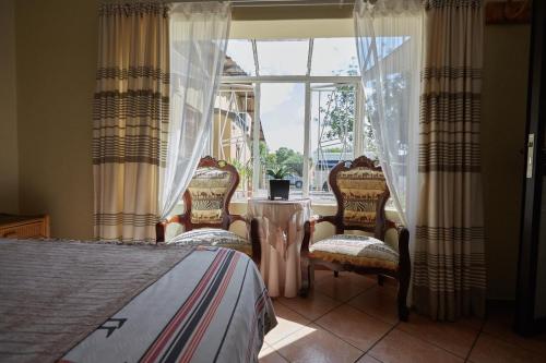 African Kwela Guest House客房内的一张或多张床位