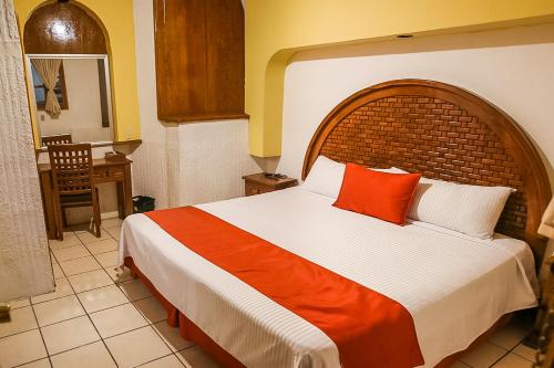 波萨达托洛萨酒店客房内的一张或多张床位