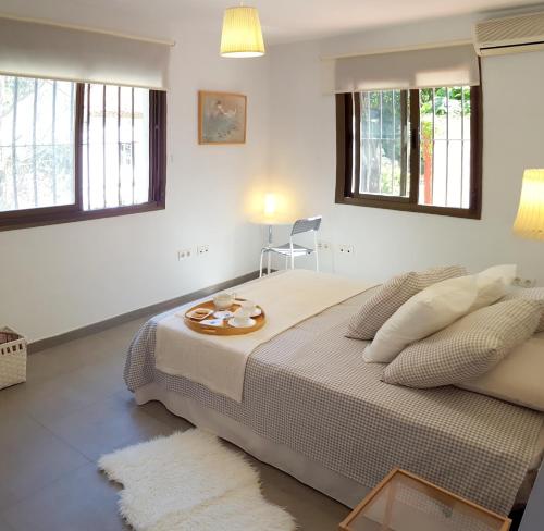 Quiet House in Malaga客房内的一张或多张床位