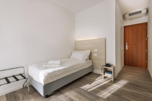 Hotel Internazionale Luino客房内的一张或多张床位