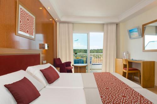 圣米歇尔大西洋公园酒店客房内的一张或多张床位