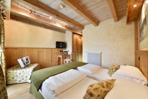 Hotel Miravidi a Cervinia客房内的一张或多张床位
