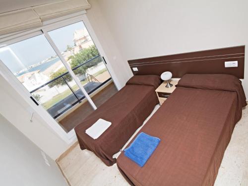 Apartamentos Almadraba VyB客房内的一张或多张床位