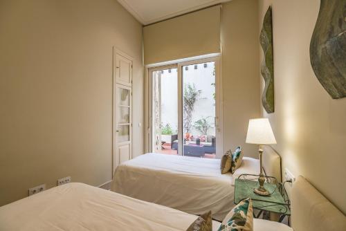 Puerta Principe Luxury Apartments客房内的一张或多张床位