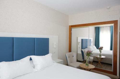 阿利坎特卡斯蒂利亚酒店客房内的一张或多张床位