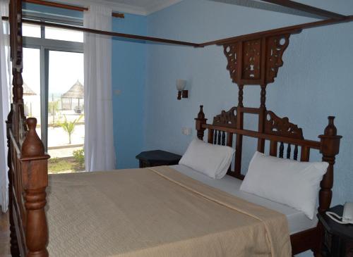 Serene Beach Resort客房内的一张或多张床位