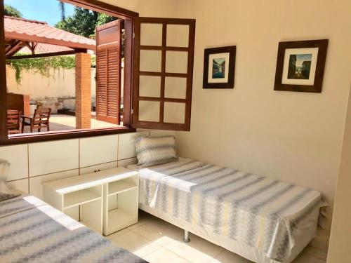 Margem da Lagoa Santa客房内的一张或多张床位