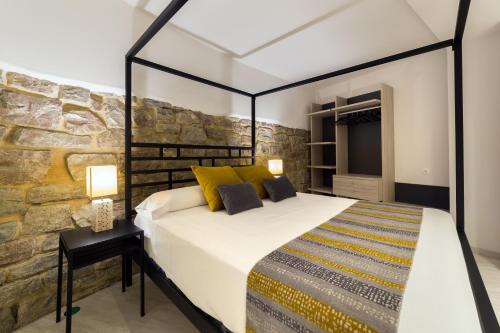 Hotel Onyarbi客房内的一张或多张床位