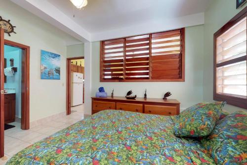Hibiscus @ Caribe Island客房内的一张或多张床位