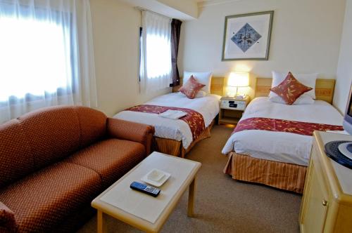 宇都宫中心酒店客房内的一张或多张床位