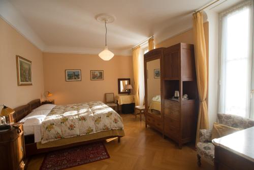 奥利维多酒店客房内的一张或多张床位