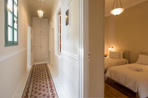 雅典艺术装饰公寓客房内的一张或多张床位