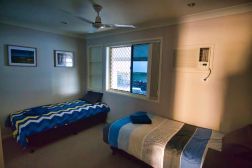Mount Gravatt Guesthouse客房内的一张或多张床位