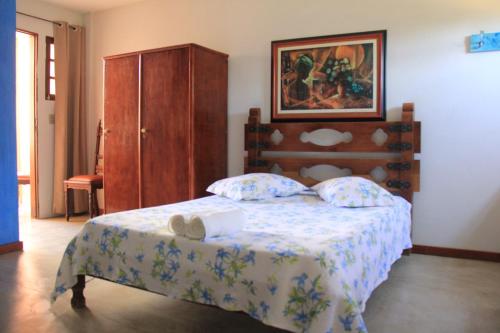 Pousada Vista Bela客房内的一张或多张床位