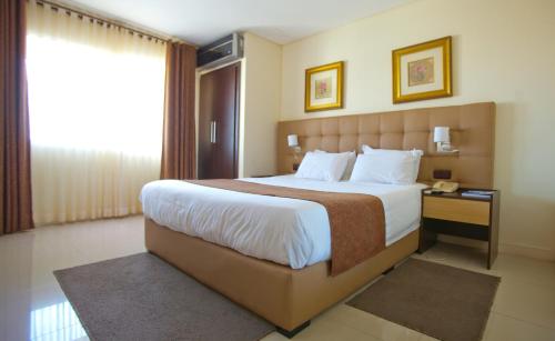 Hotel Monte Carlo客房内的一张或多张床位