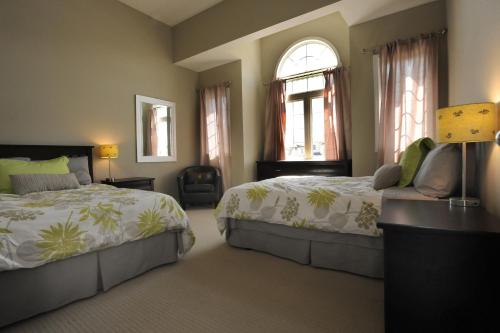 浮桥之家行政旅馆客房内的一张或多张床位