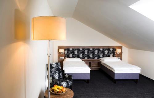 博得洛基库利亚疗养酒店客房内的一张或多张床位