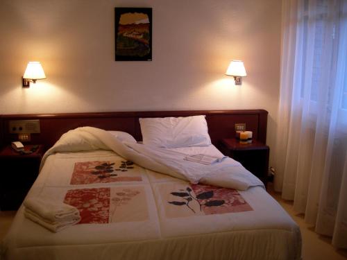 加泰罗尼亚赫斯特莉亚酒店客房内的一张或多张床位