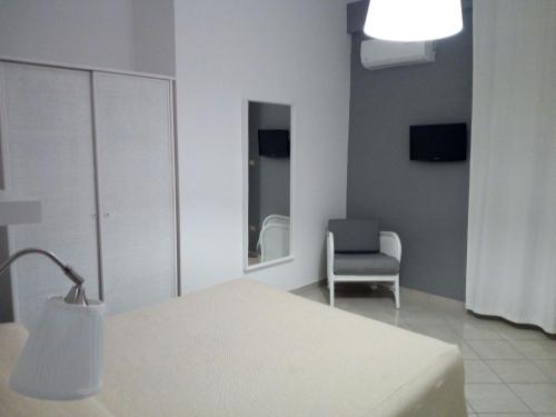 Mini Hotel - Angolo Di Paradiso -客房内的一张或多张床位