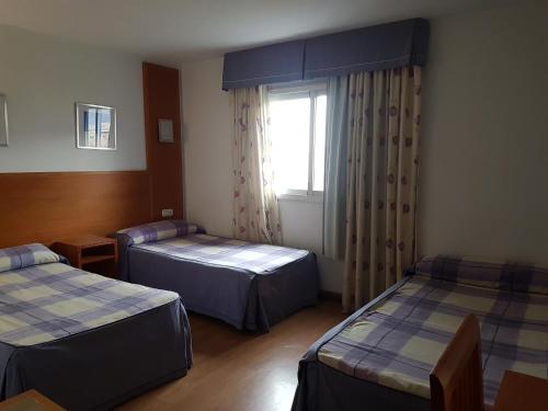 地中海旅馆 客房内的一张或多张床位
