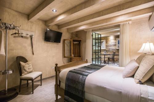 奥利弗精品酒店 - 世界小型豪华酒店集团客房内的一张或多张床位