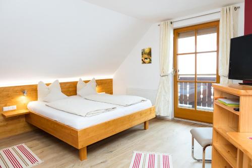 Gästehaus - Camping- Weinhof Radl客房内的一张或多张床位