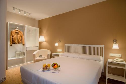 络丝思加雷斯酒店客房内的一张或多张床位