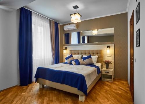 ANTARES Apart hotel客房内的一张或多张床位