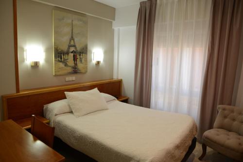 埃斯库德罗酒店客房内的一张或多张床位