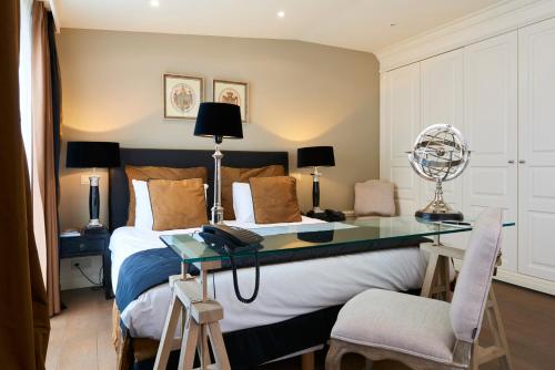 斯坦霍普酒店 - 索恩酒店旗下客房内的一张或多张床位