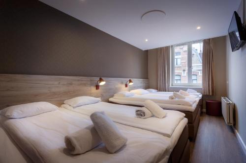 阿姆斯特丹市中心酒店客房内的一张或多张床位