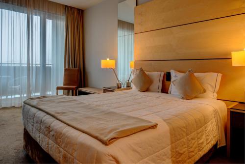 VIP行政亚速尔群岛酒店客房内的一张或多张床位