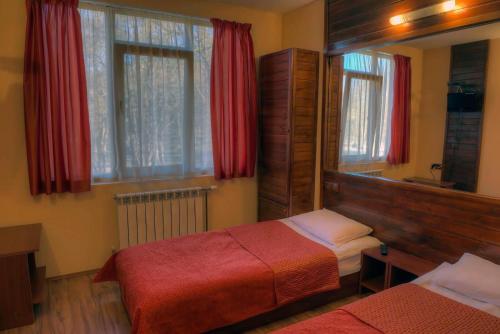 Комплекс Шуменско плато客房内的一张或多张床位