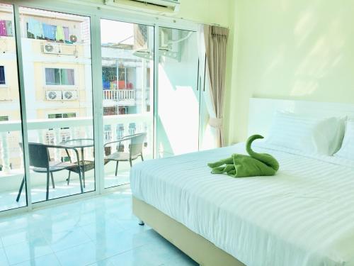 泰国兰花经济型酒店客房内的一张或多张床位