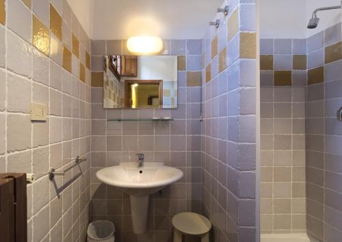 赫尔维西亚比萨塔酒店的一间浴室