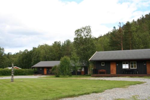 阿尔塔Gargia Lodge的小木屋,带院子和房子