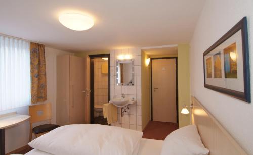 Hotel Haus am Berg客房内的一张或多张床位