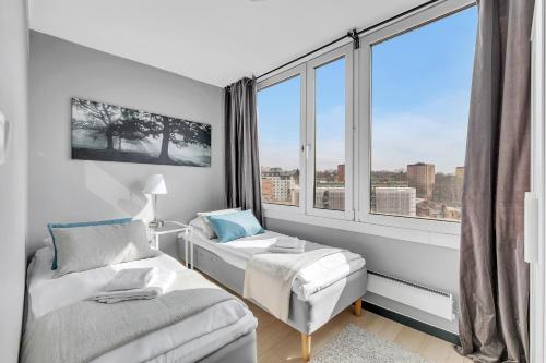 Forenom Serviced Apartments Oslo Rosenhoff客房内的一张或多张床位