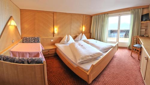 奥博塔波霍弗酒店客房内的一张或多张床位
