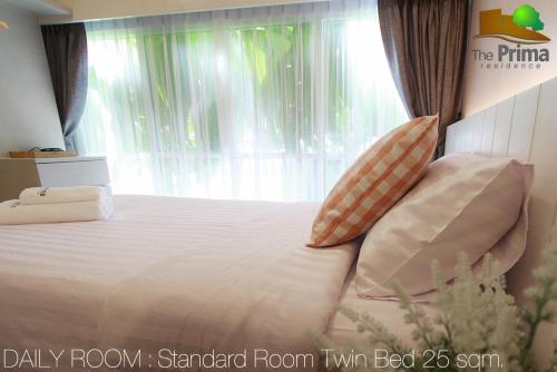  普里玛住宿酒店 - SHA Certificate客房内的一张或多张床位