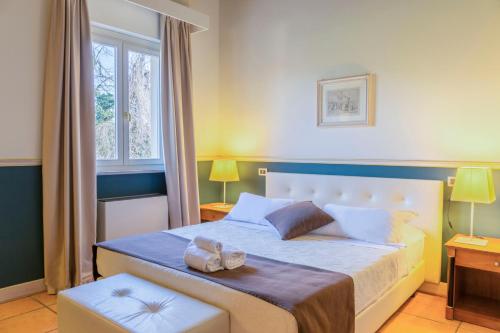 蓬迪里亚托酒店客房内的一张或多张床位