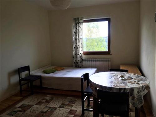 Dom Na Wzgórzu客房内的一张或多张床位
