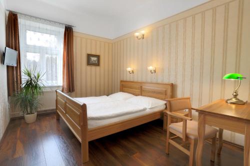 赫鲁巴斯卡拉什特克尔酒店客房内的一张或多张床位