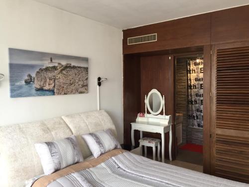 Praia da Rocha Apartment客房内的一张或多张床位