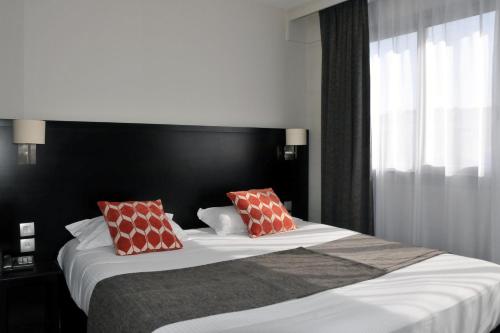 加特兰酒店客房内的一张或多张床位