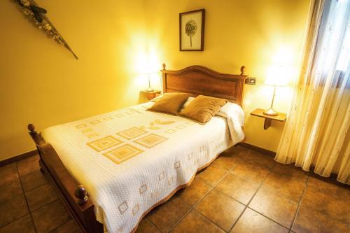 伊克瓜乡村旅馆客房内的一张或多张床位