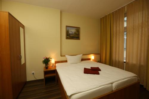 艾科尼格施酒店客房内的一张或多张床位