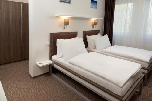布拉格天空酒店客房内的一张或多张床位