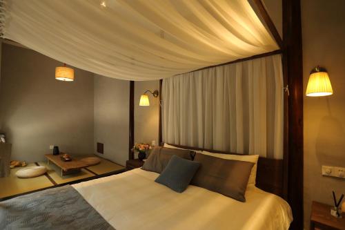扬州重构文化民宿客房内的一张或多张床位
