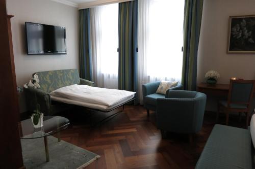 赫克特阿彭策尔酒店客房内的一张或多张床位